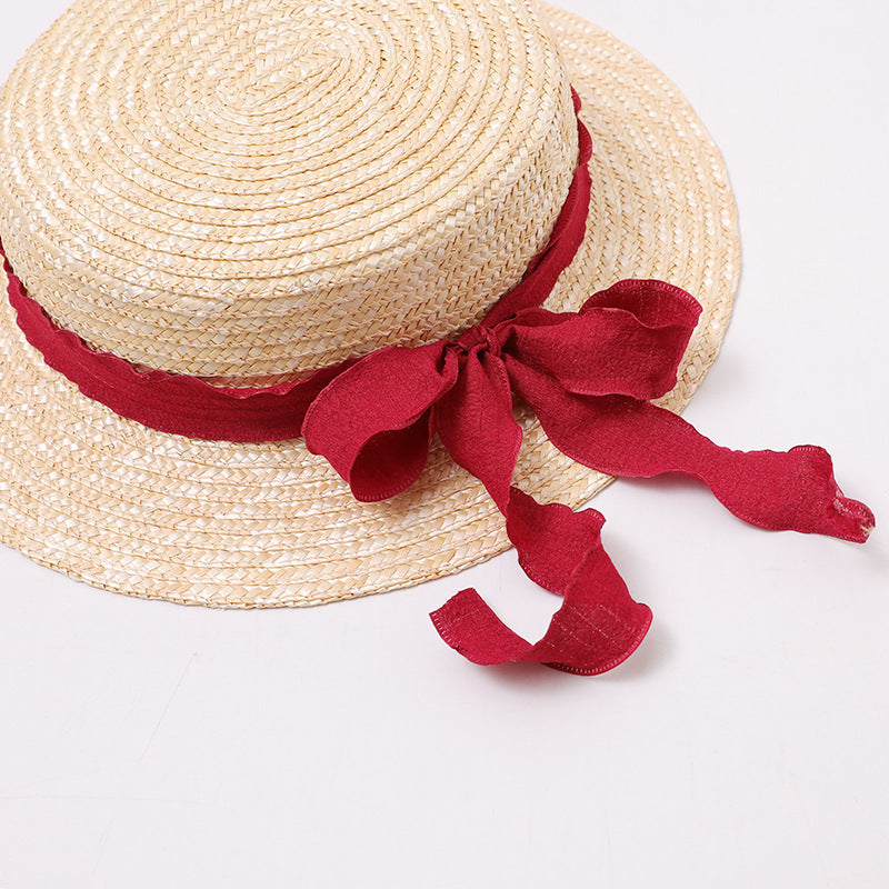 Straw Boater Hat with Red Ribbon Bow